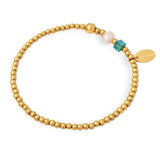 Goudkleurige roestvrijstalen kralenarmband met zoetwaterparel en kristal, model Katy